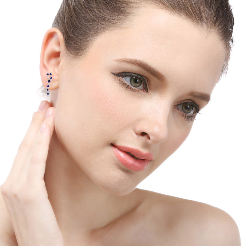 Model wearing the blue Big Dipper sterling silver stud earrings