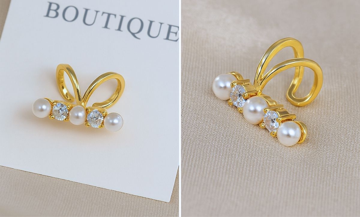 Close-up of gold clip on ear cuff with pearls and cubic zirconia – custom jewelry supplier for gifts