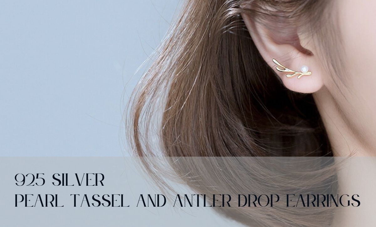 Model wearing 925 silver pearl tassel and antler drop earrings in gold, ideal for boutique wholesale jewelry