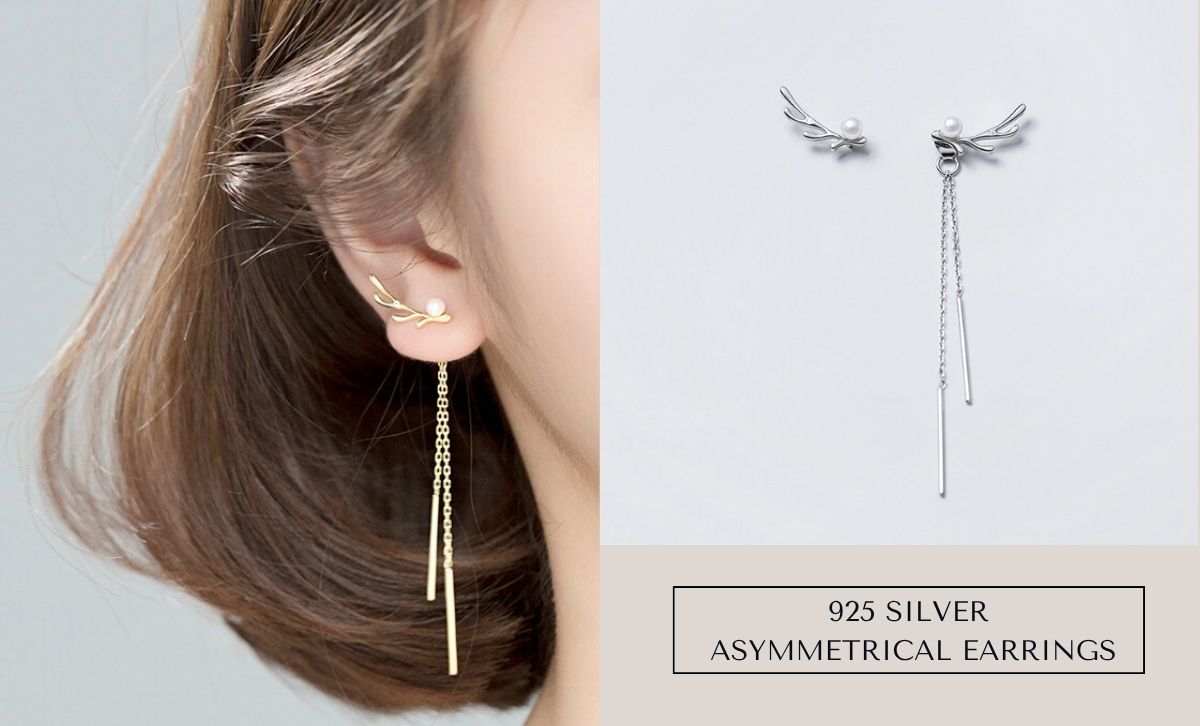Close-up of gold and silver asymmetrical antler earrings with pearl tassel, 925 silver jewelry for wholesale