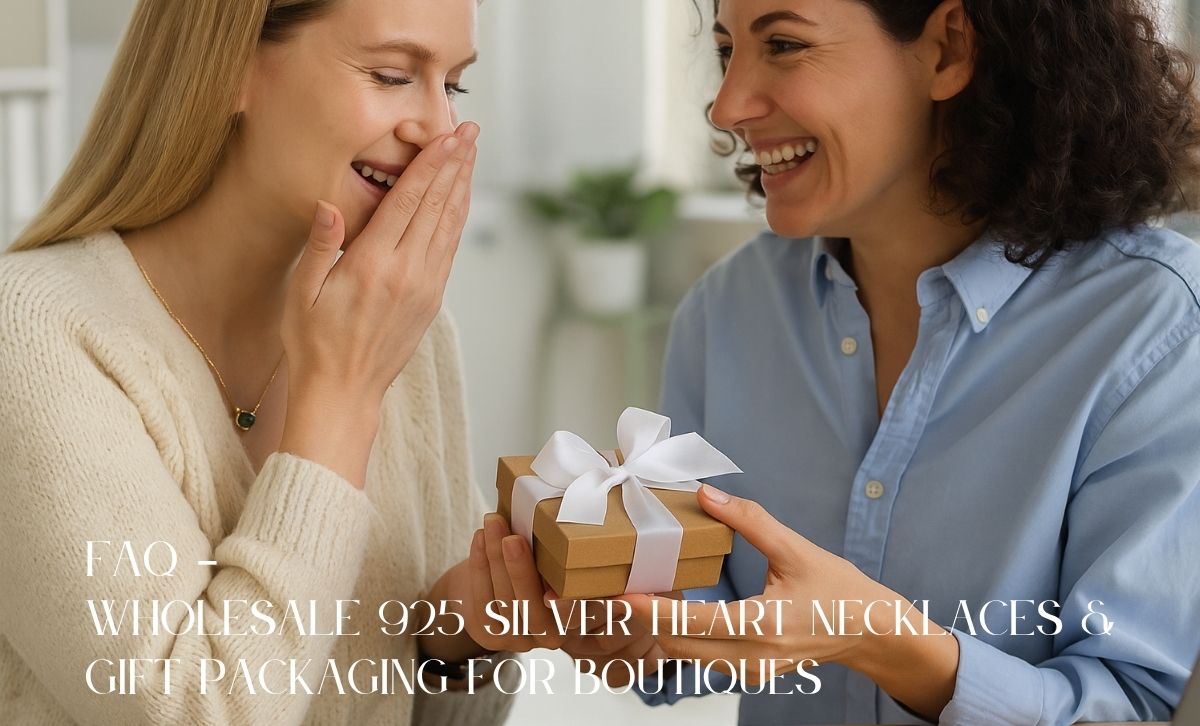 Smiling women exchanging gift-wrapped 925 silver heart necklace—ideal as boutique wholesale jewelry for colleague and friend gifting.