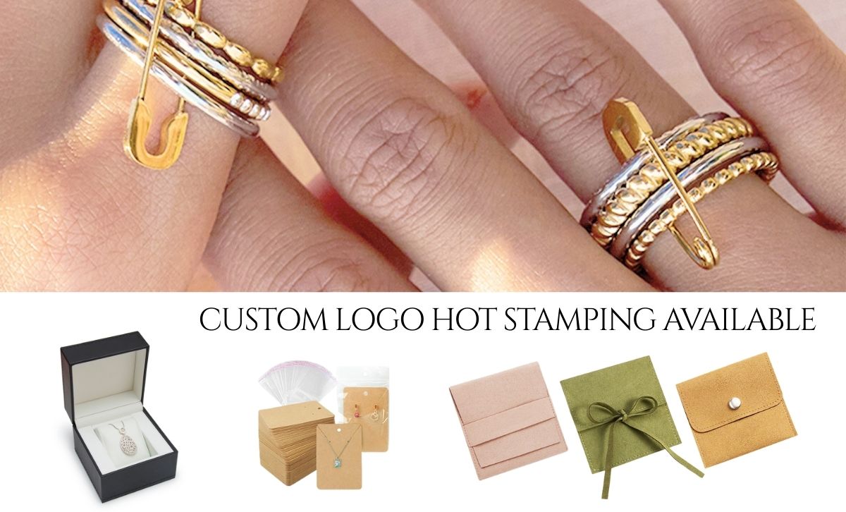 Adjustable stainless steel safety pin charm rings, trendy two tone stackable rings wholesale for fashion jewelry resellers.