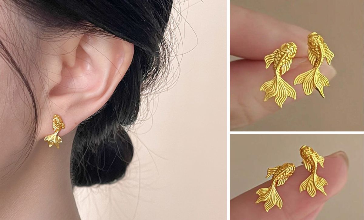 Model wearing koi fish earrings, gold plated brass studs designed as Lunar New Year lucky earrings for women.