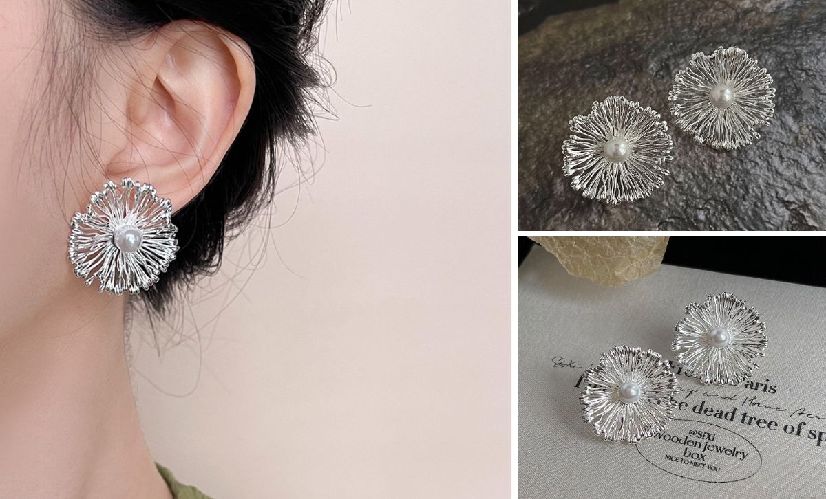 Model wearing statement floral earrings with elegant pearl center, stylish designer style earrings for women.