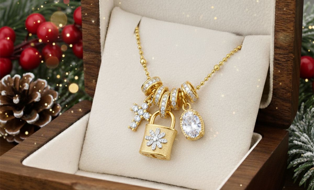 Padlock charm necklace in silver and gold designer style displayed on velvet board — boutique jewelry wholesale and brass jewelry supplier collection.