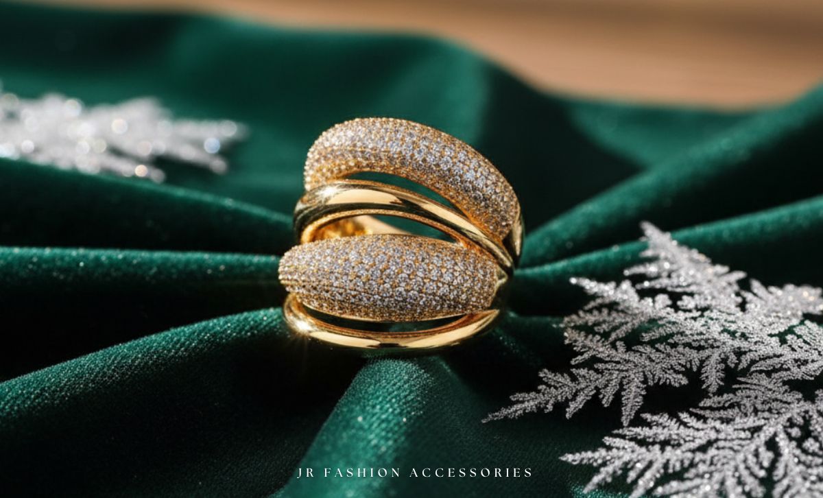 Close-up of gold plated brass ring with CZ stones on green velvet background – JR Fashion Accessories