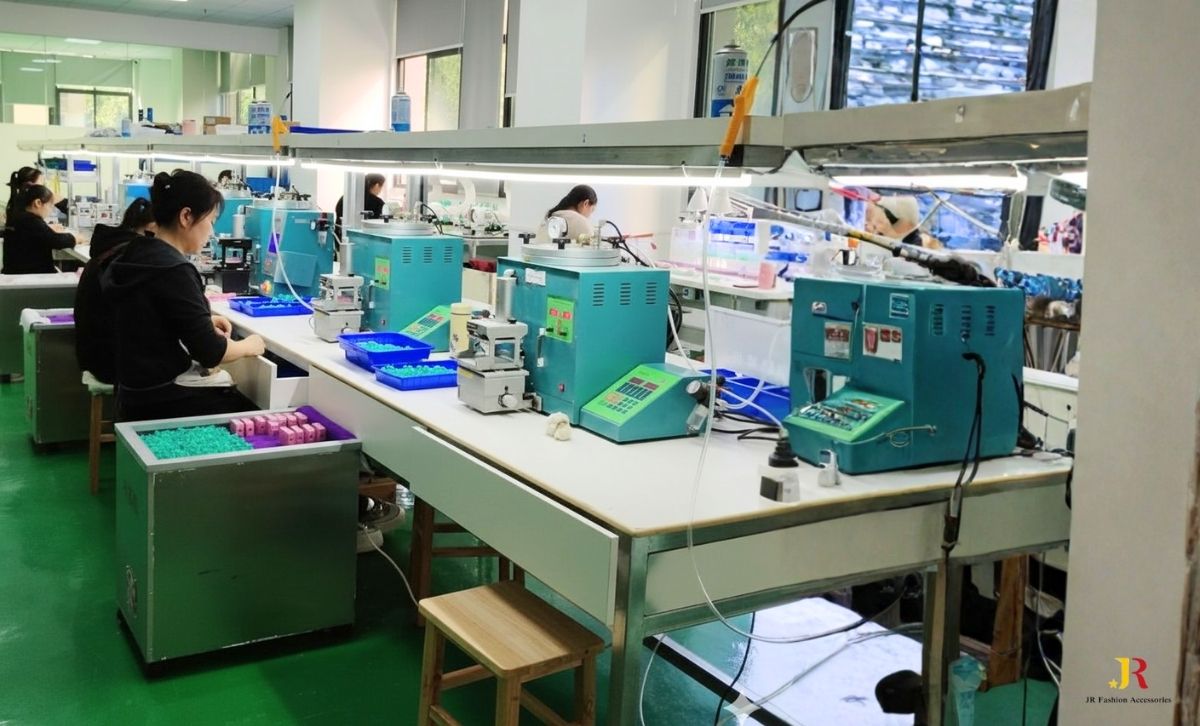 Materials we work with including 316L stainless steel jewelry, brass and eco-brass, 925 sterling silver, PVD gold plated jewelry, CZ and gemstones, and ethically sourced jewelry supplies.